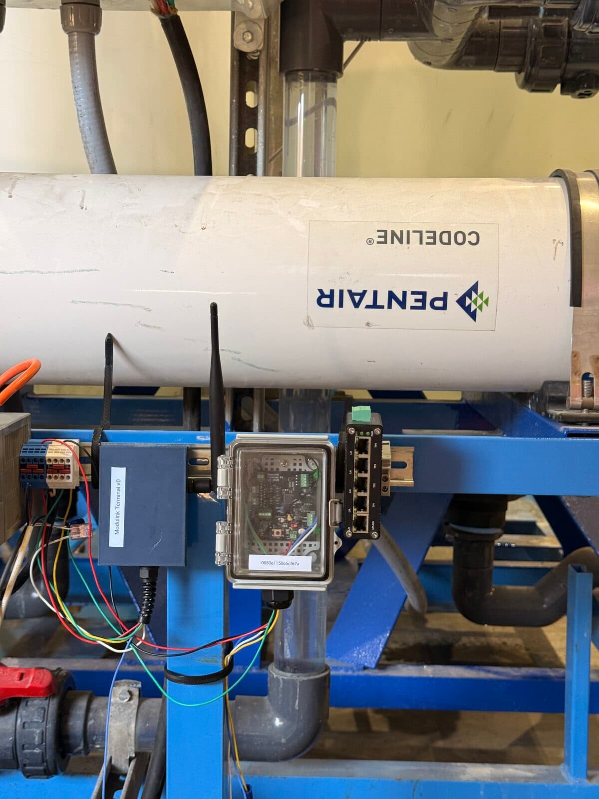 Modulink Terminal deployed on RO skid with antenna and sensor cables
